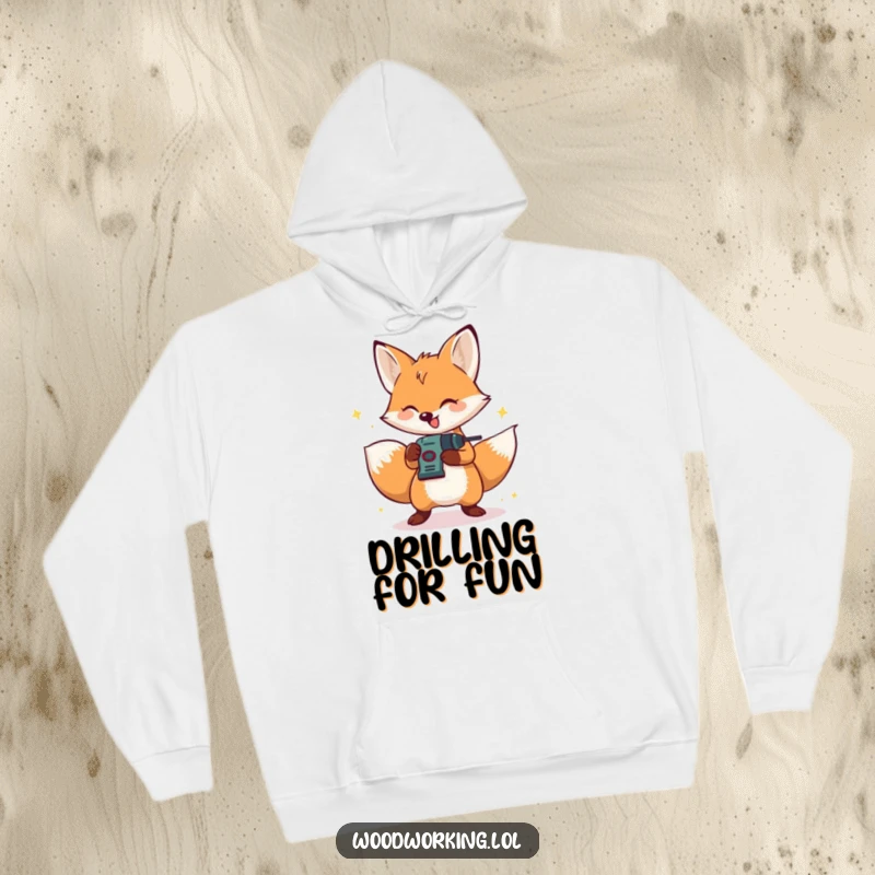 Funny, cozy hoodie with a happy fox energetically operating a small drill, radiating DIY enthusiasm.