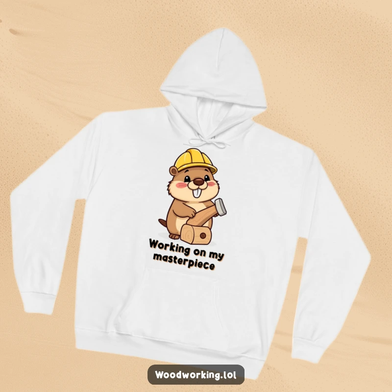Funny hoodie featuring a happy beaver wearing a tiny hard hat, busy hammering a wonderfully wonky wooden toy.