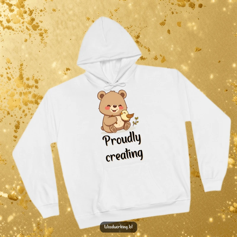 Funny bear proudly carving a small wooden bird, depicted on a cozy hoodie for ultimate comfort.